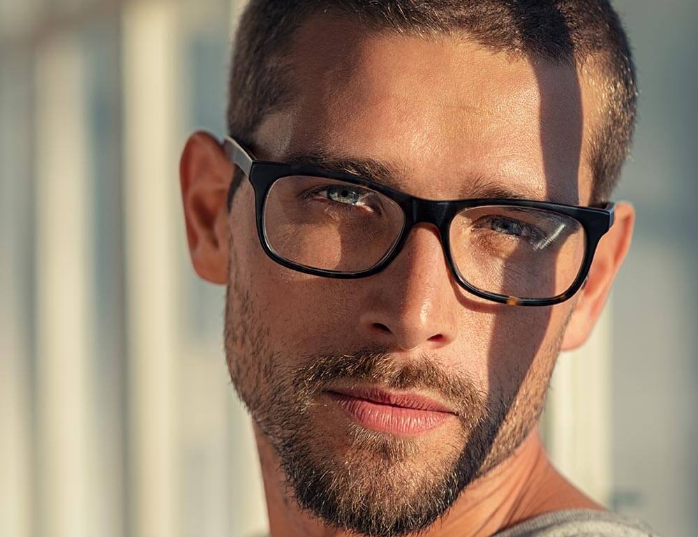 Young man in stylish glasses