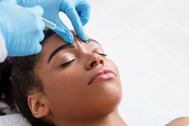 Woman getting BOTOX treatment